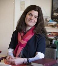 A profile photograph of Professor Caroline Warman
